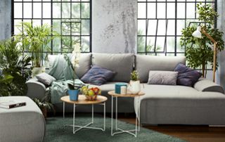 grand canapé gris avec pouf